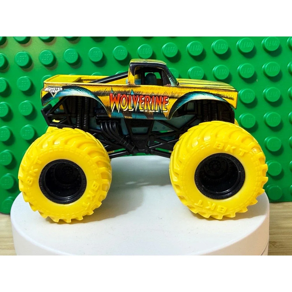 Monster Jam Wolverine Monster Truck 1:64 Die-Cast Marvel Yellow BKT Tires